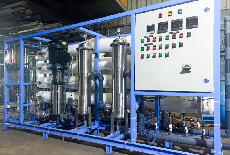 Reverse osmosis plant with control panel and pressure vessels for industrial water purification