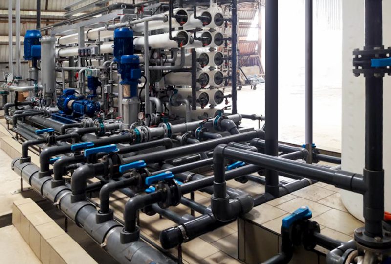 Close-up of piping and valves in a reverse osmosis plant setup